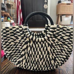 Black and white woven handbag